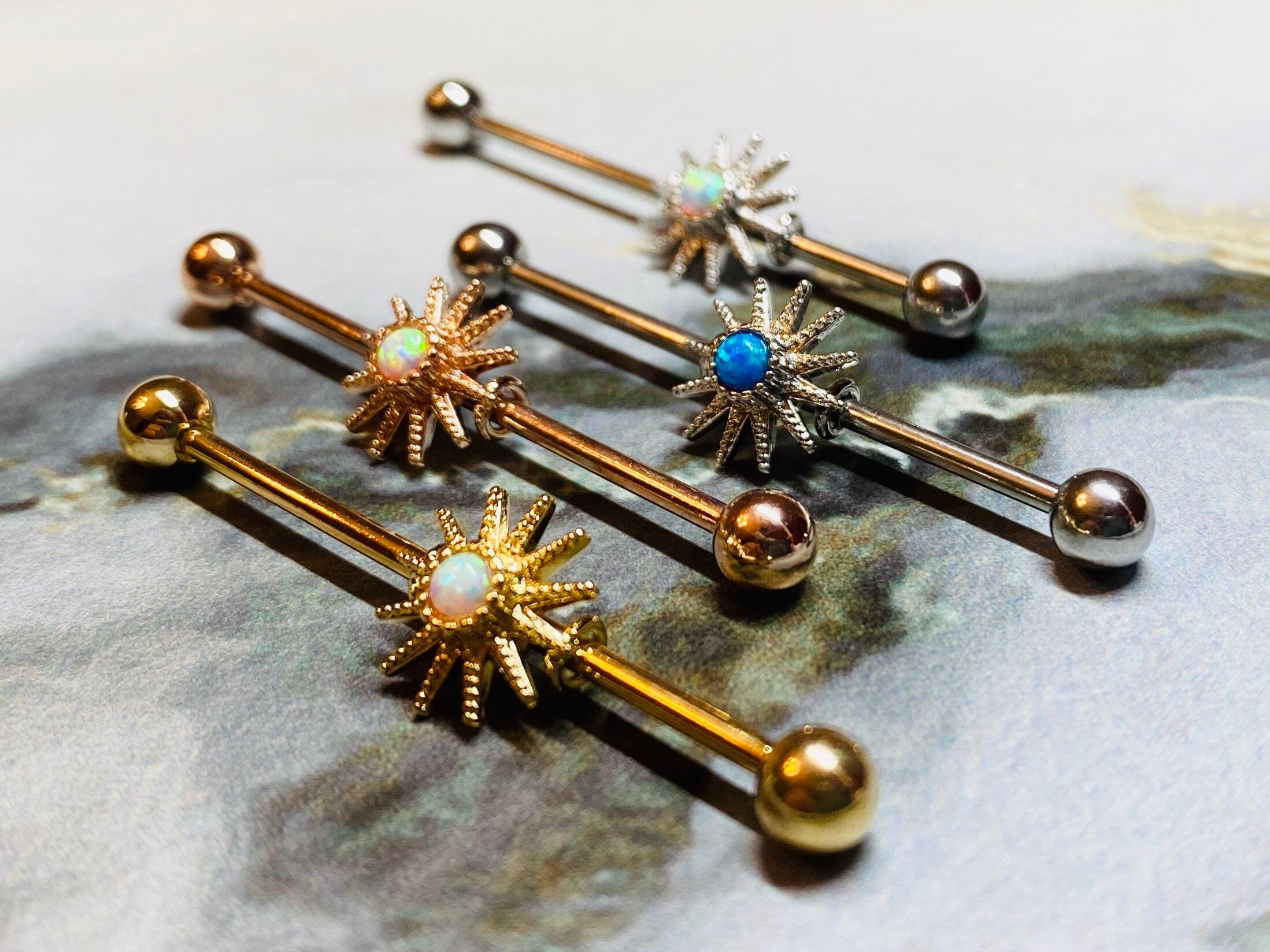 Opal centered sunburst Industrial Barbell. Industrial Piercing.