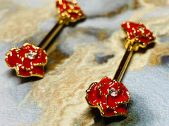 A set of Gold Red Rose Nipple Barbell