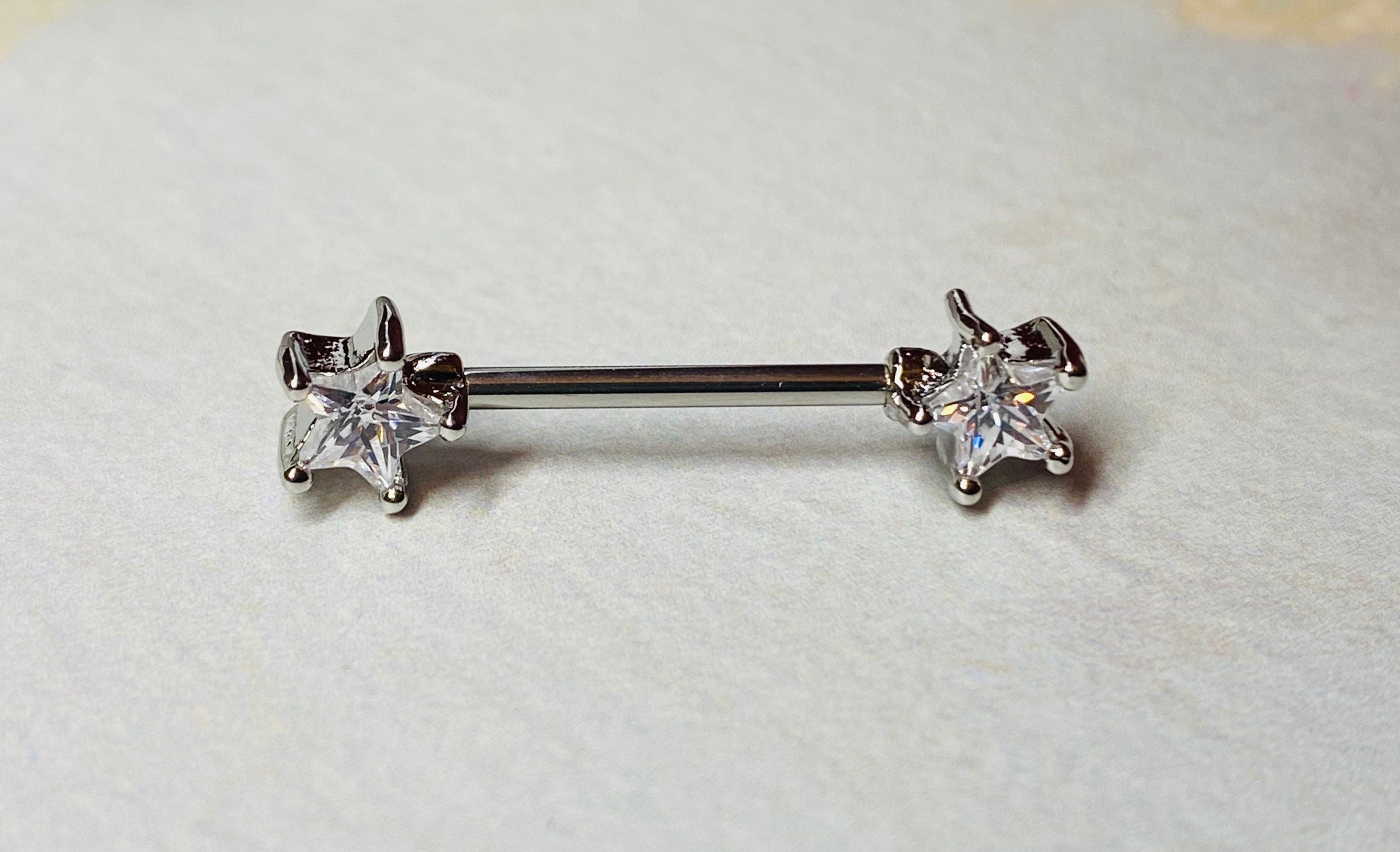 A set of Classic Star Clear Stone Nipple Barbell Ring. Nipple Jewelry. Nipple Piercings.