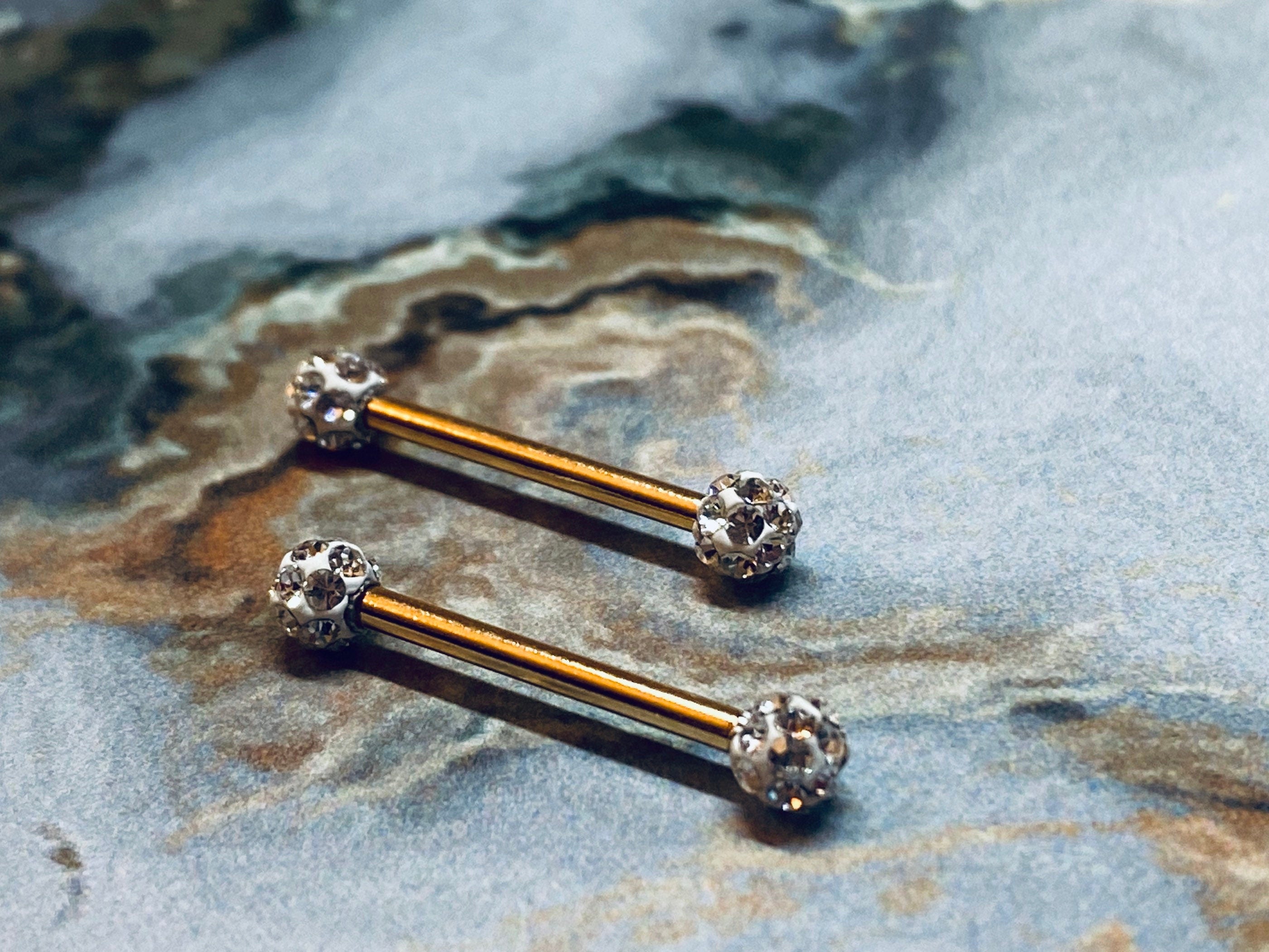 A set of Classic Gold Sprinkled Clear Gems Nipple Barbell. Nipple Piercings. Nipple Jewelry.