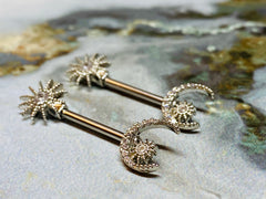 A set of Sun and Crescent Moon Nipple Barbell. Nipple Piercings. Nipple Rings. Nipple Jewelry.