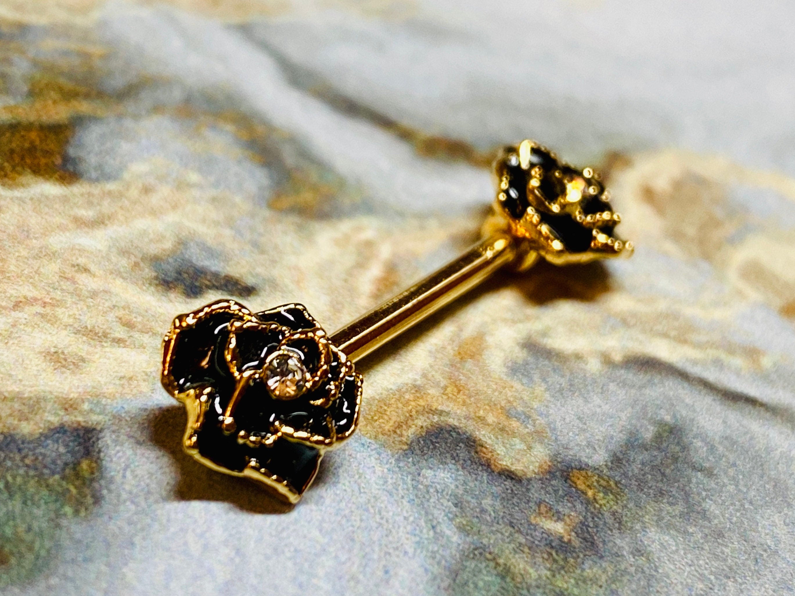 A set of Sparkling Gold Rose Nipple Barbell