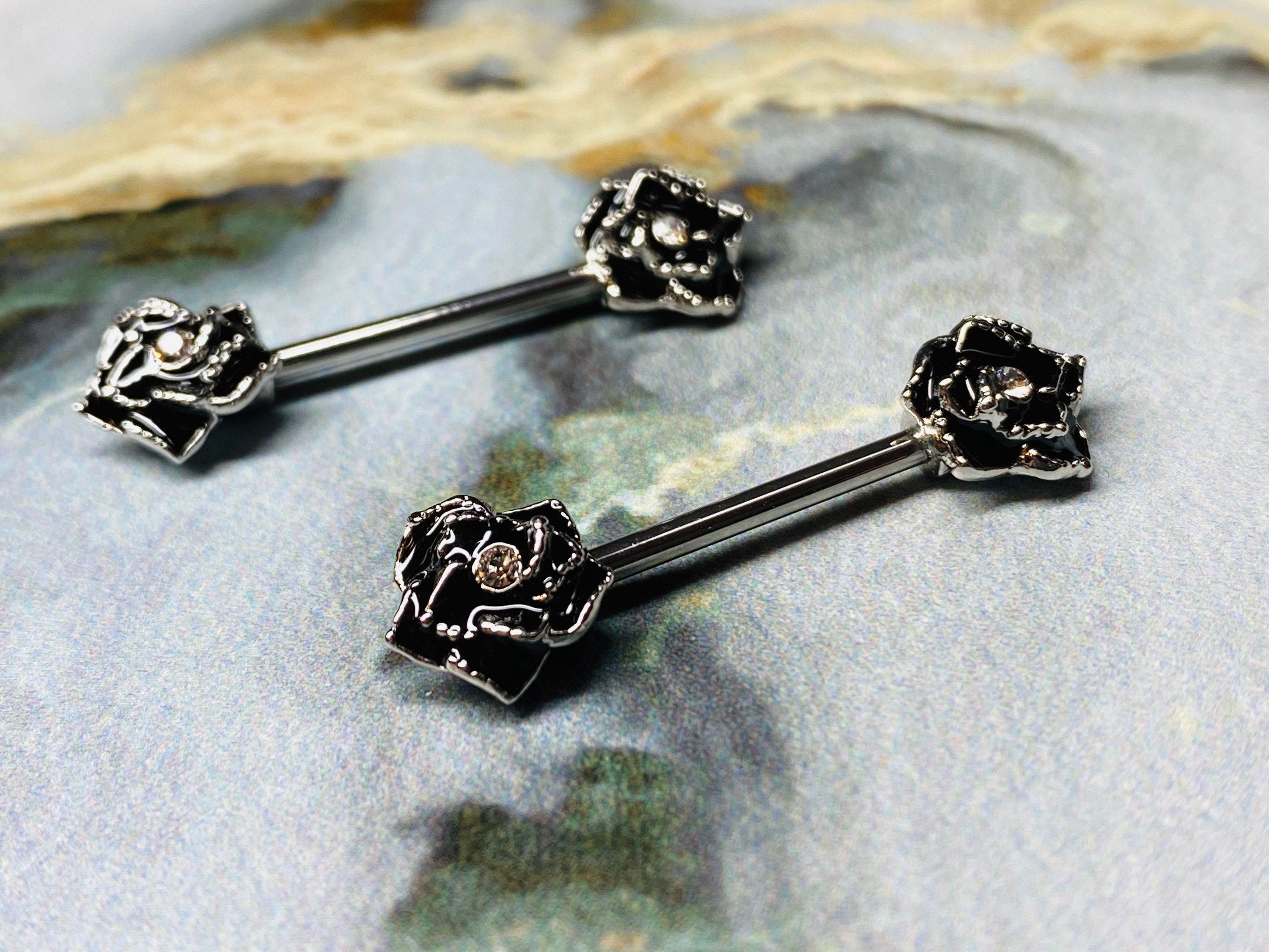 A set of Classic Rose Nipple Barbell