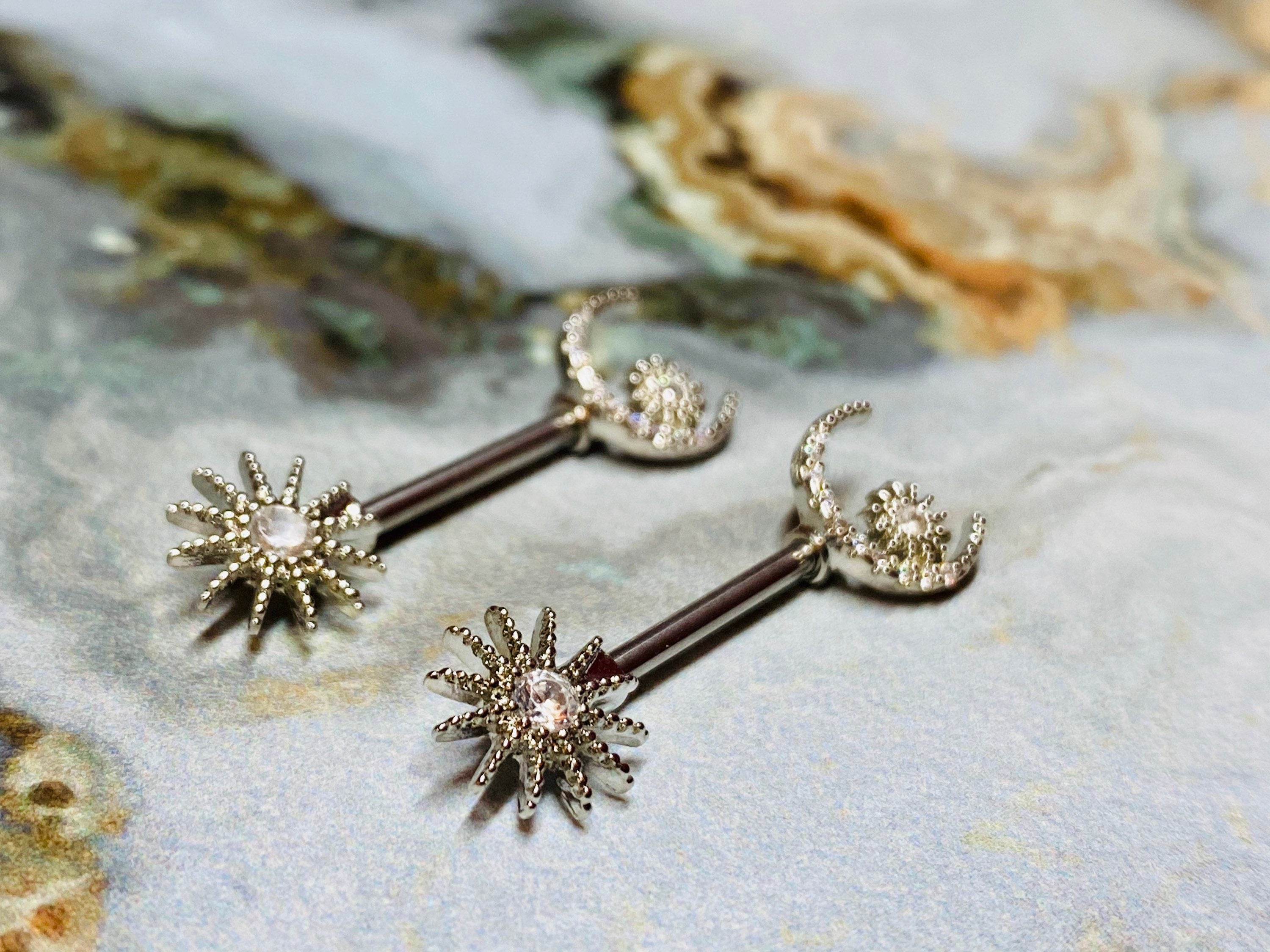 A set of Sun and Crescent Moon Nipple Barbell. Nipple Piercings. Nipple Rings. Nipple Jewelry.