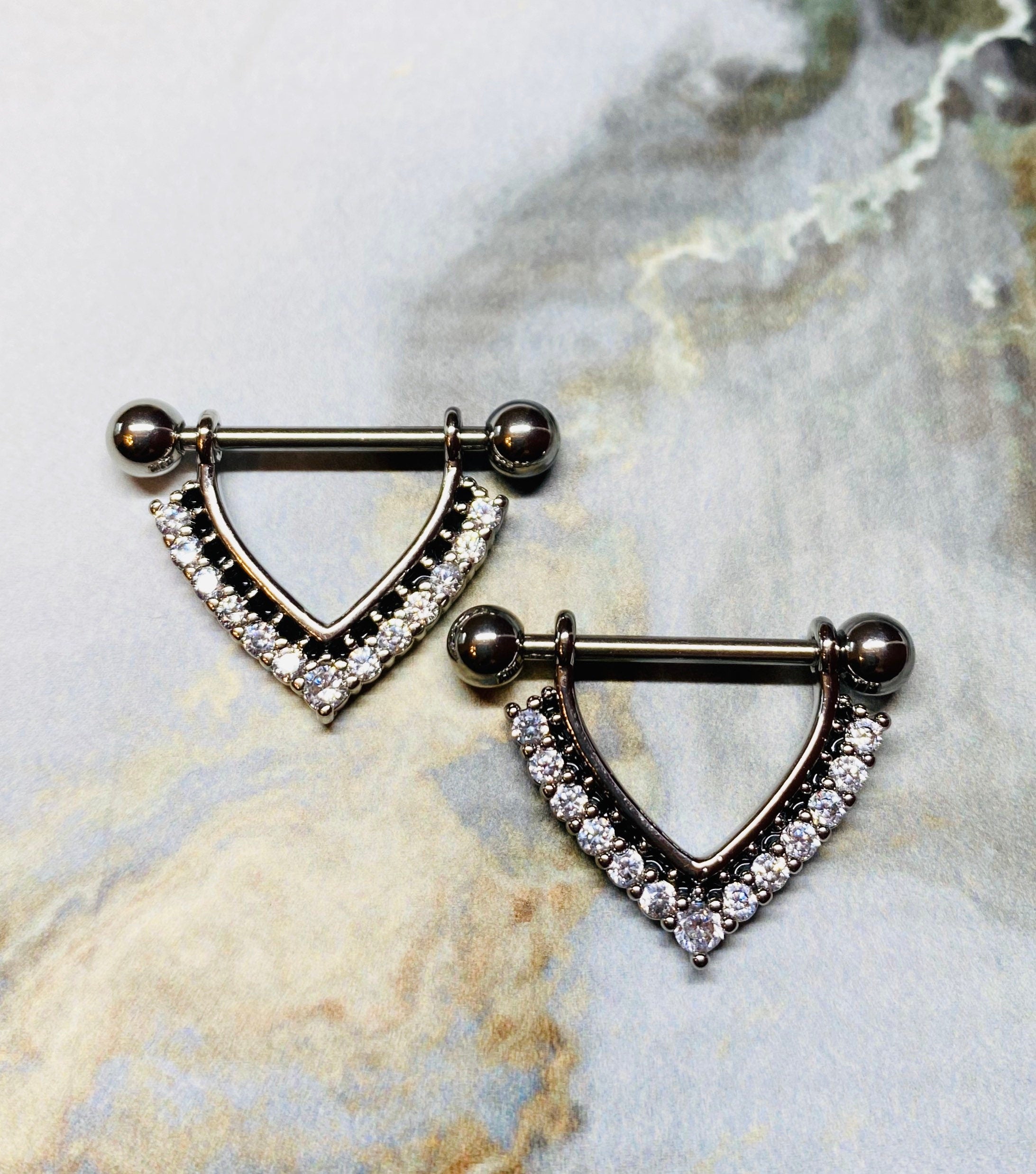 A set of Clear Stones Paved Chevron Shaped Nipple Barbells. Nipple Piercings. Nipple Jewlery. Nipple Rings.