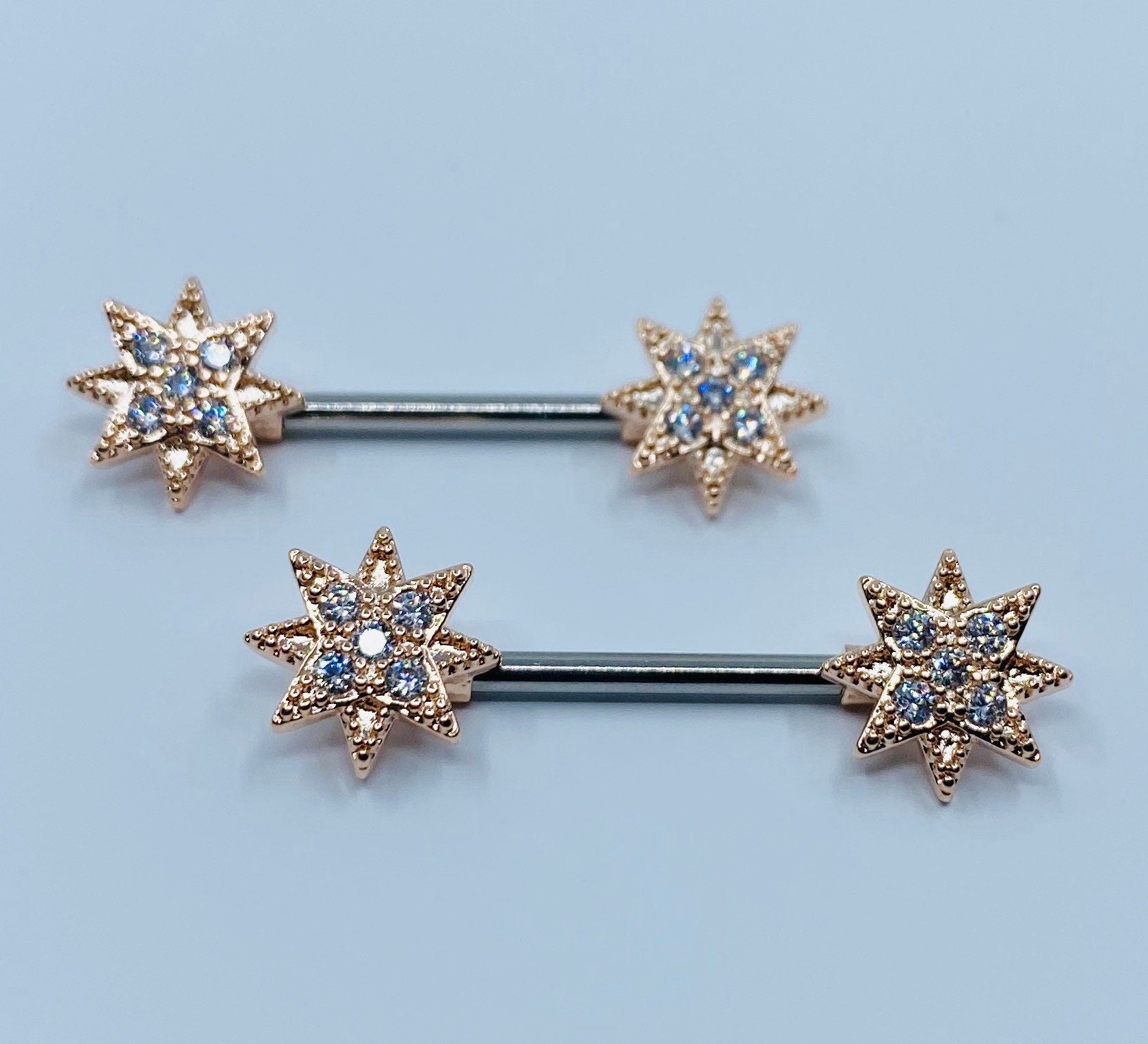 14G Clear Stones Starburst Ends Nipple Barbells. Nipple Piercings. Nipple Jewelry. Nipple Rings.