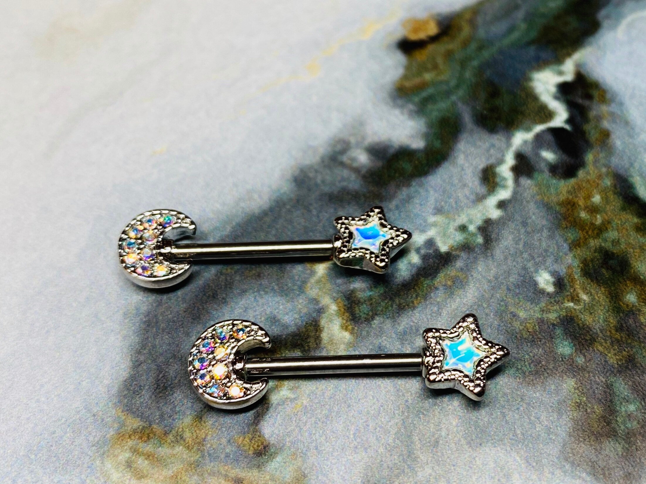 A set of Glistening Star and Moon with center stones Nipple Barbells. Nipple Piercings. Nipple Rings. Nipple Jewlery.