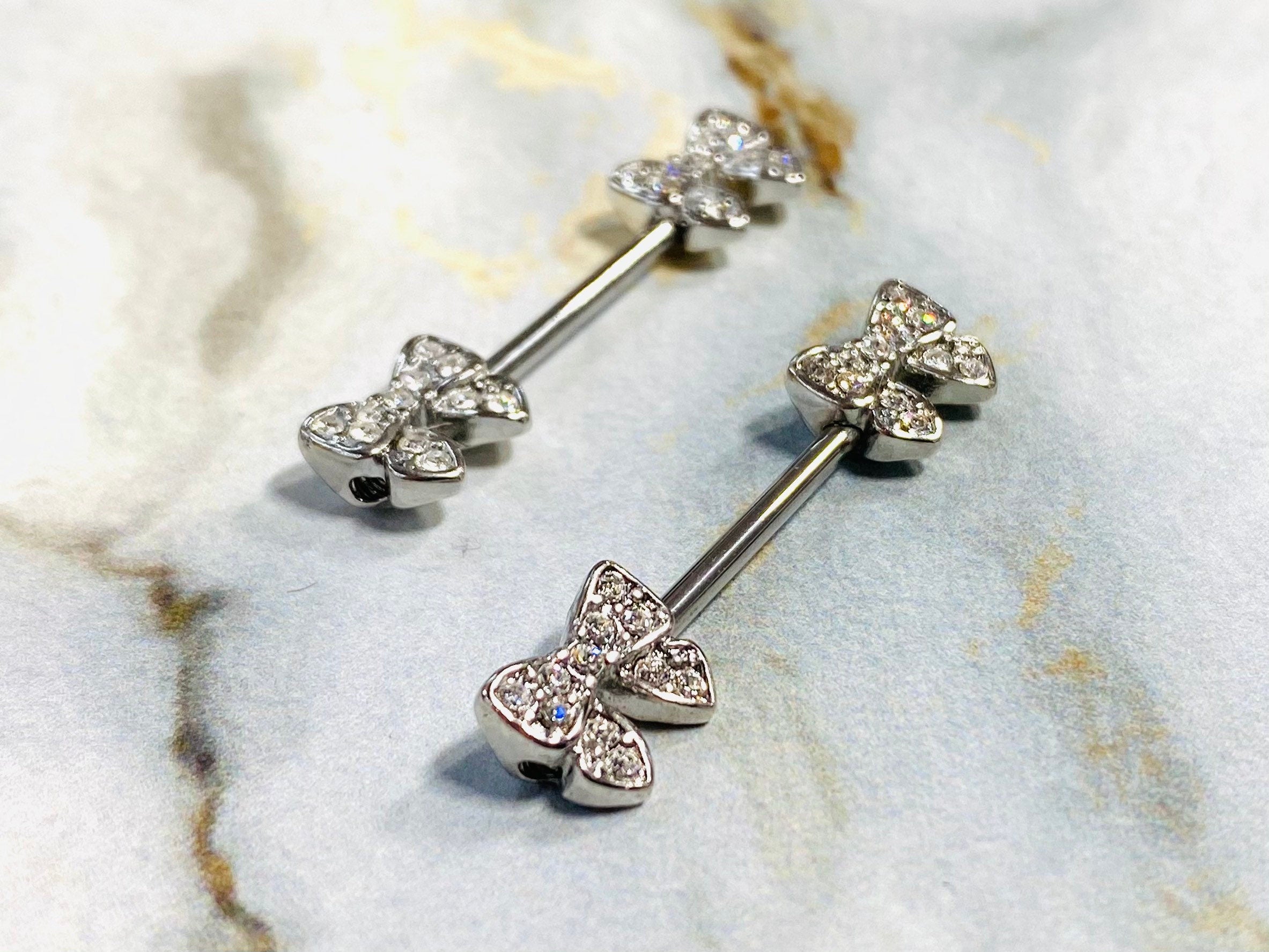 14G Silver Dainty and Sparkling Bow-Tie Nipple Barbell. Nipple Piercings. Nipple Rings. Nipple Jewelry.