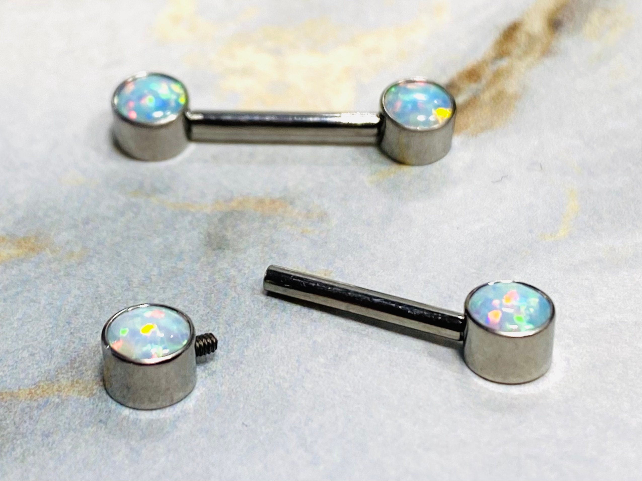 14G Implant Grade Titanium Internally Threaded White Opal Nipple Barbells. Nipple Rings. Nipple Piercings. Nipple Jewelry.