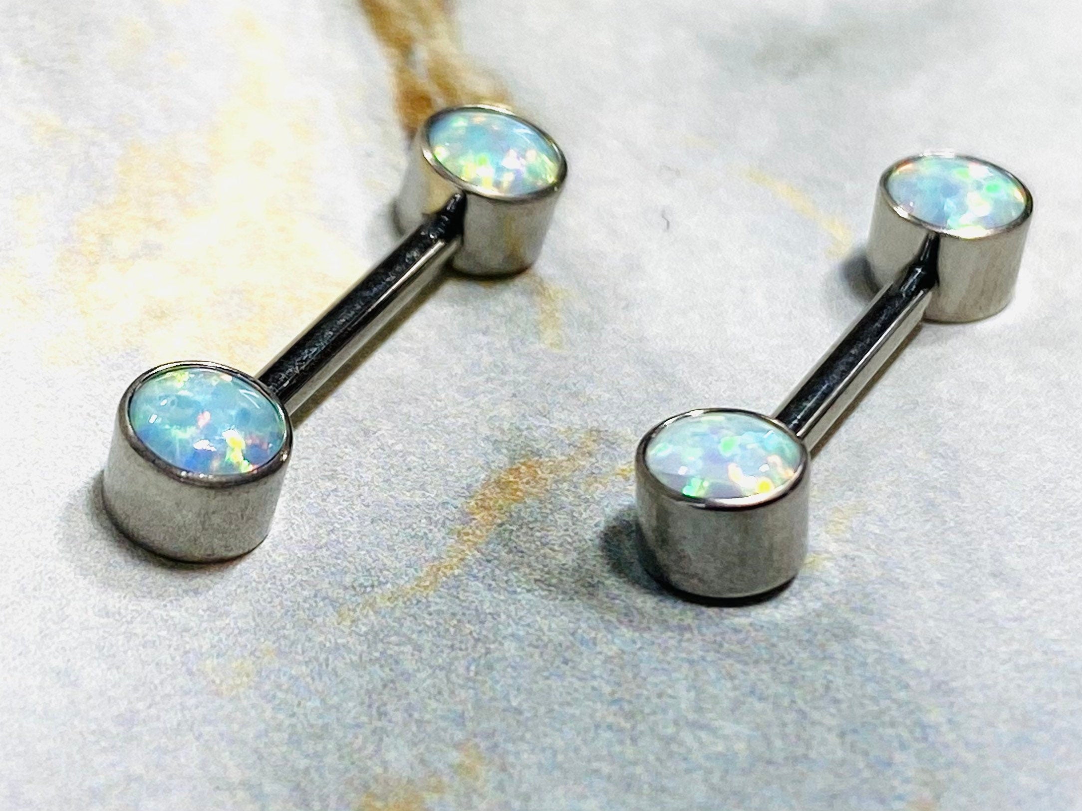 14G Implant Grade Titanium Internally Threaded White Opal Nipple Barbells. Nipple Rings. Nipple Piercings. Nipple Jewelry.