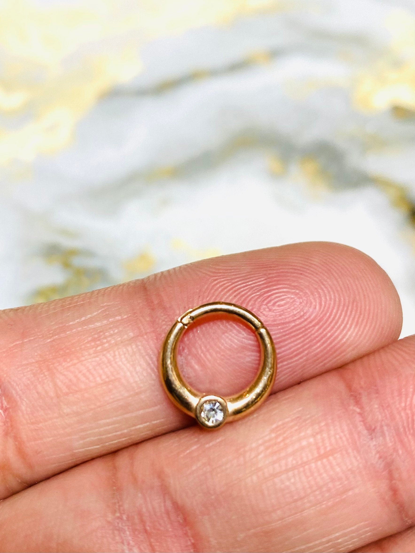 16G Rose Gold Clear Center Stone Hinged Clicker Hoop for Septum, Cartlilage, Tragus & More..