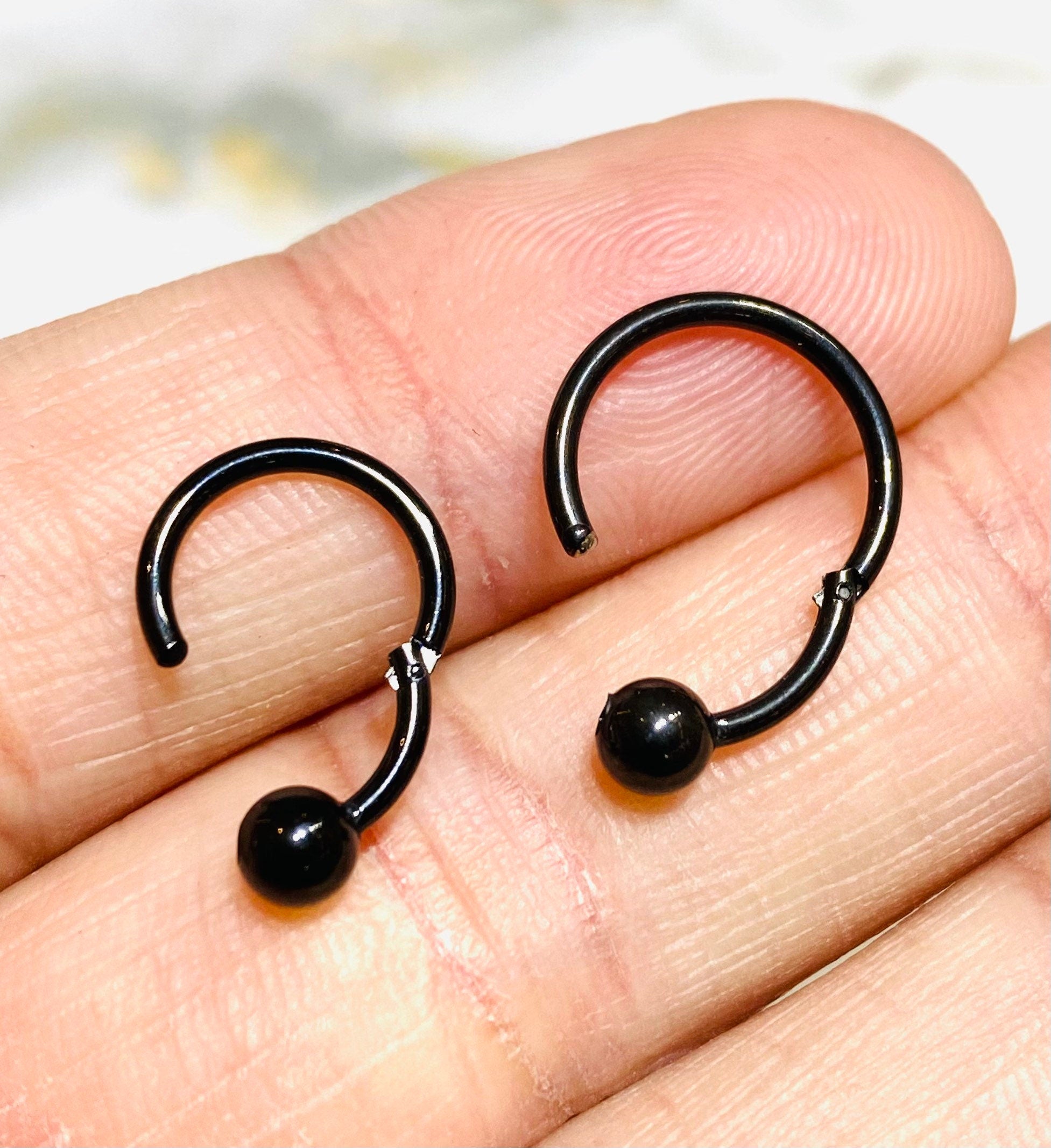 16G Black Hinged Hoop Clicker with Undetachable Ball Center for Nose, Septum, Cartilage, Tragus Piercing and More. 8MM & 10MM.