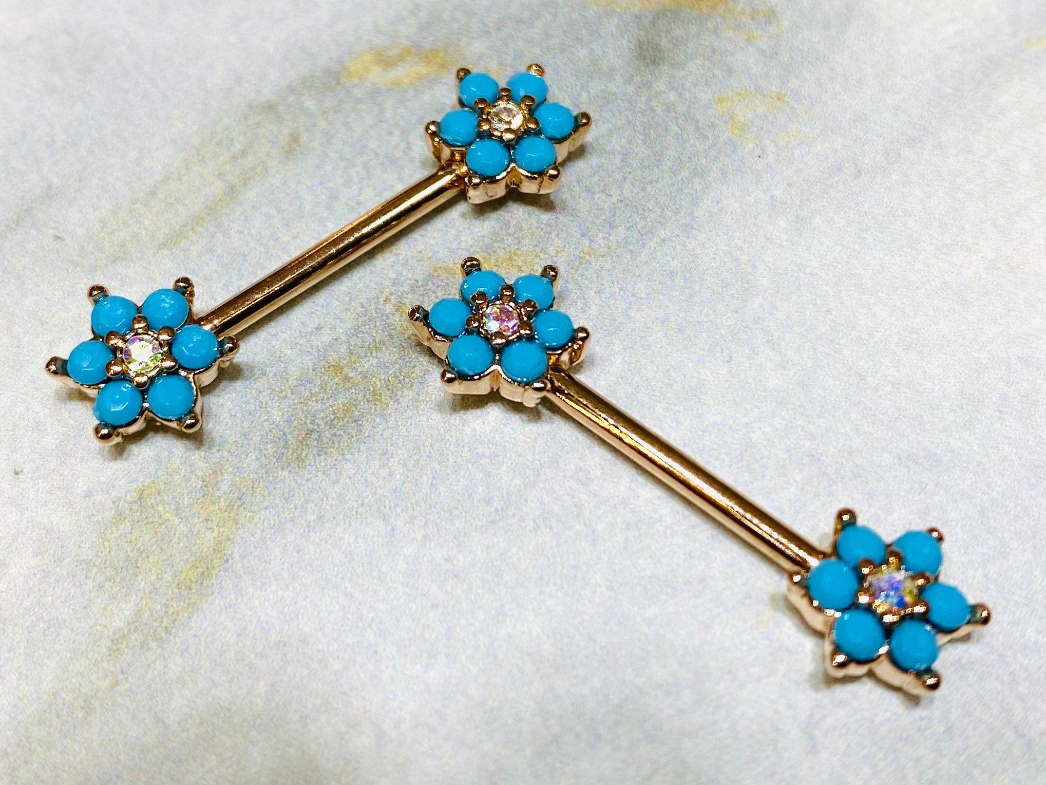 Pair of 14G Rose Gold Turquoise Flower Sparkle Prong Setting Nipple Barbells. Nipple Rings. Nipple Jewelry. Nipple Piercings.