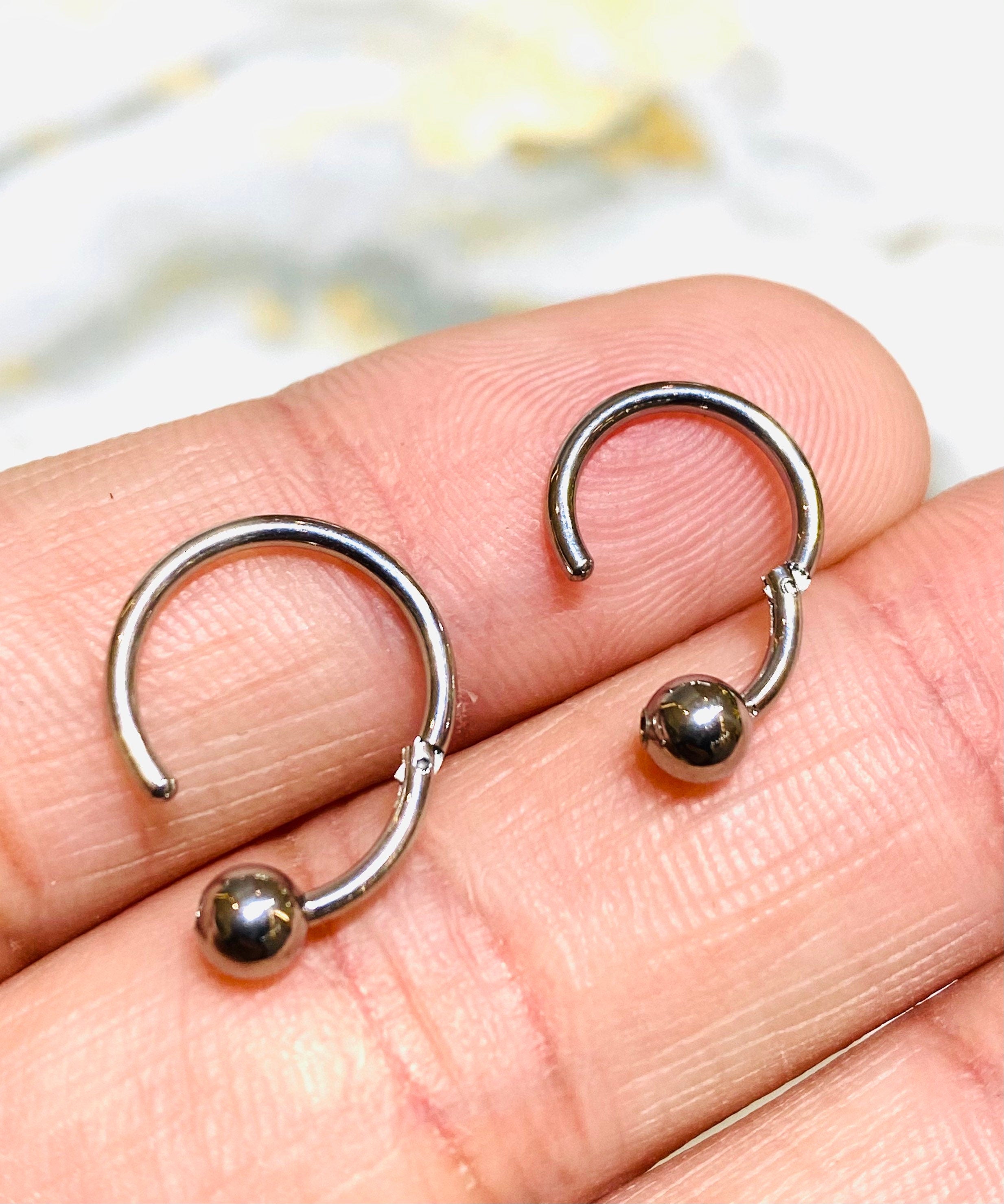 16G Silver Hinged Hoop Clicker with Undetachable Ball Center for Nose, Septum, Cartilage, Tragus Piercing and More. 8MM & 10MM.