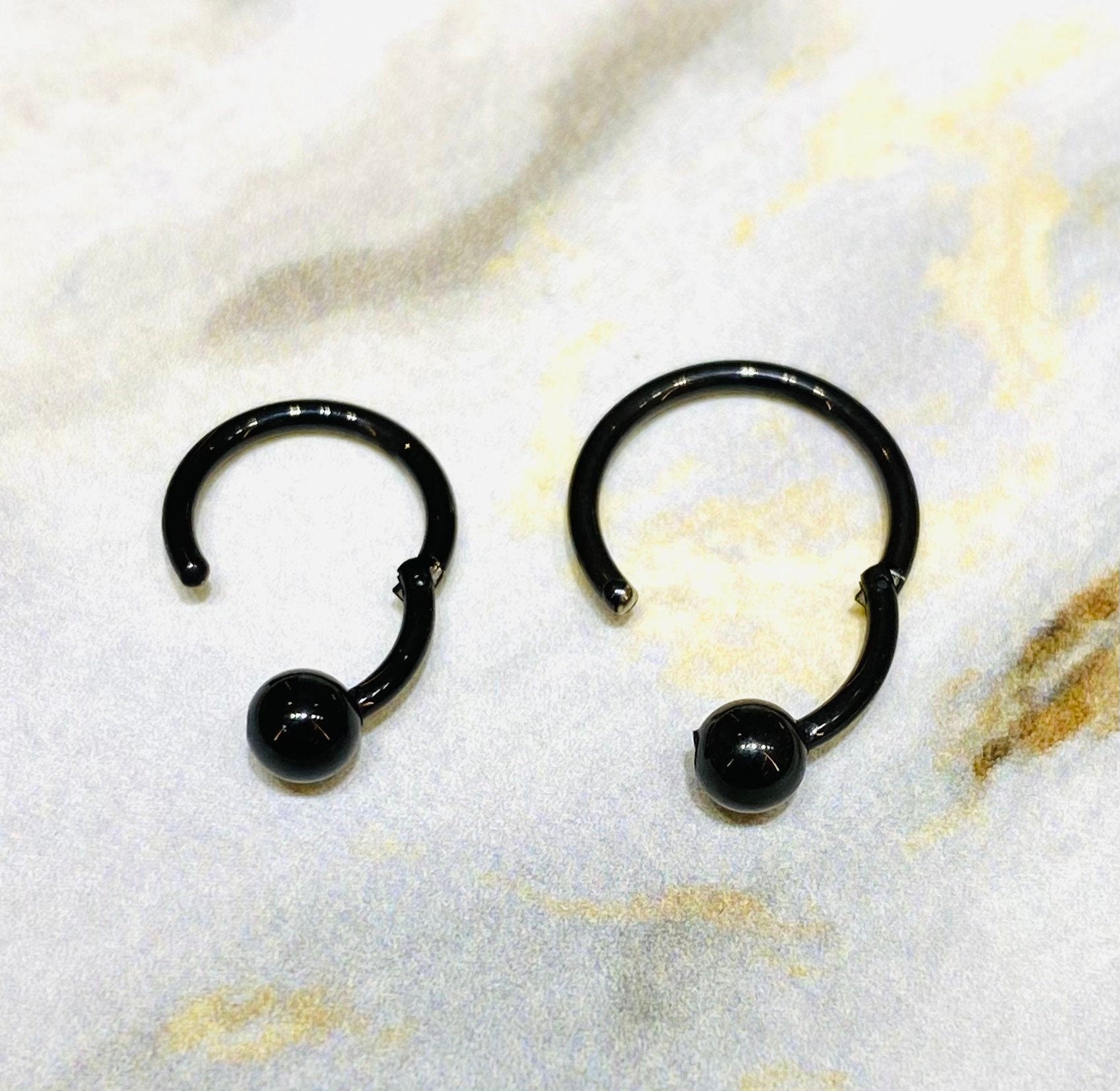 16G Black Hinged Hoop Clicker with Undetachable Ball Center for Nose, Septum, Cartilage, Tragus Piercing and More. 8MM & 10MM.