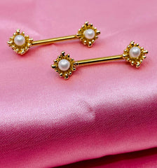 A Set of 14G Gold Sun Rays with Pearl Centered Stone Nipple Barbells. Nipple Jewelry. Nipple Piercing.