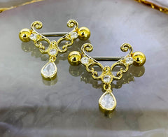 Pair of 14G Gold Heart Filigree with Dangling Teardrop Nipple Barbell.