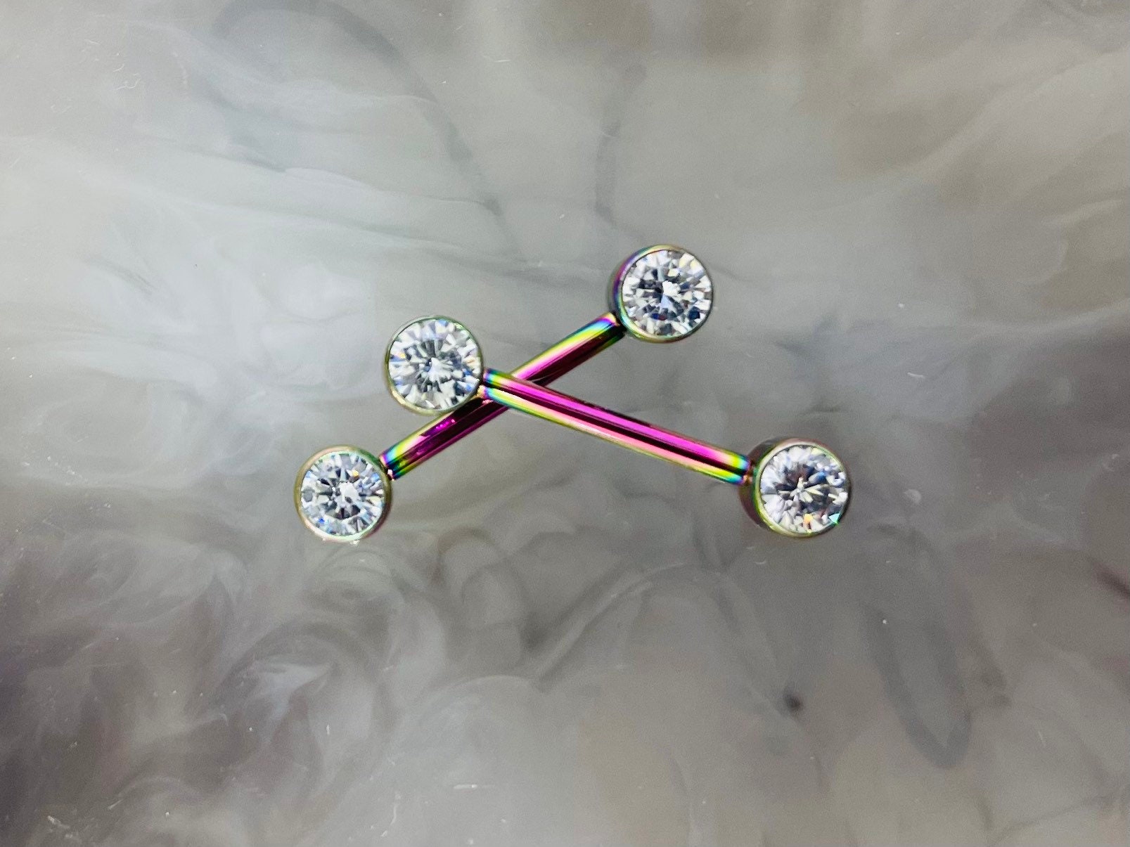 Pair of 14G Implant Grade Titanium Internally Threaded Rainbow Bezel Set Clear Stone Nipple Barbell.