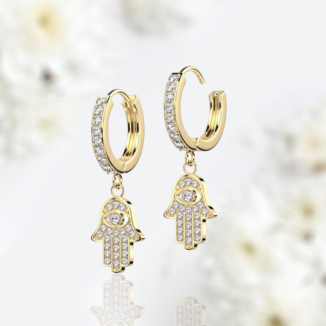 Pair of Gold Plated Clear Stones Paved Dangling Hamsa Hoop Earrings.