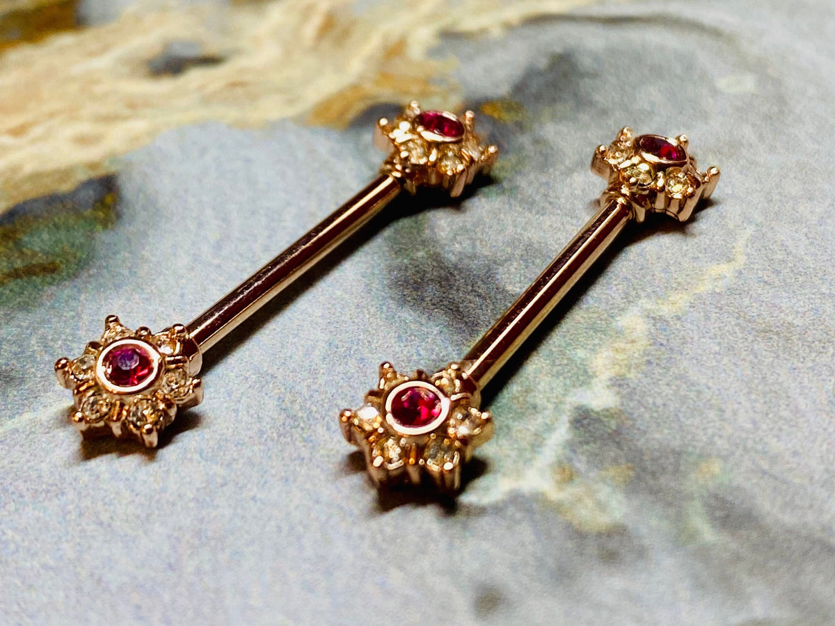 A set of Rose Gold Twinkle Stardust CZ Nipple Barbell