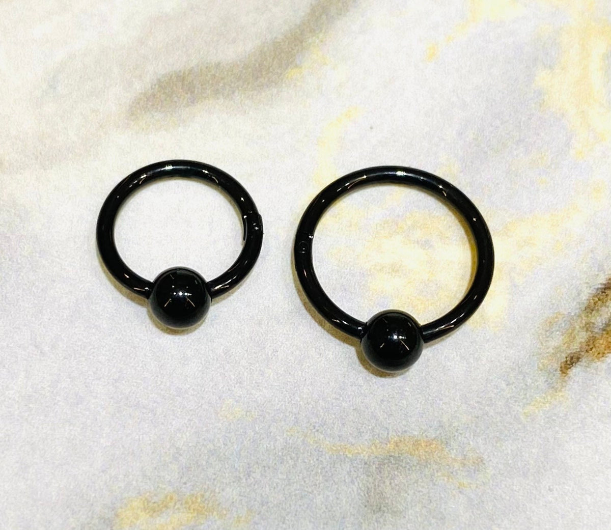 16G Black Hinged Hoop Clicker with Undetachable Ball Center for Nose, Septum, Cartilage, Tragus Piercing and More. 8MM & 10MM.