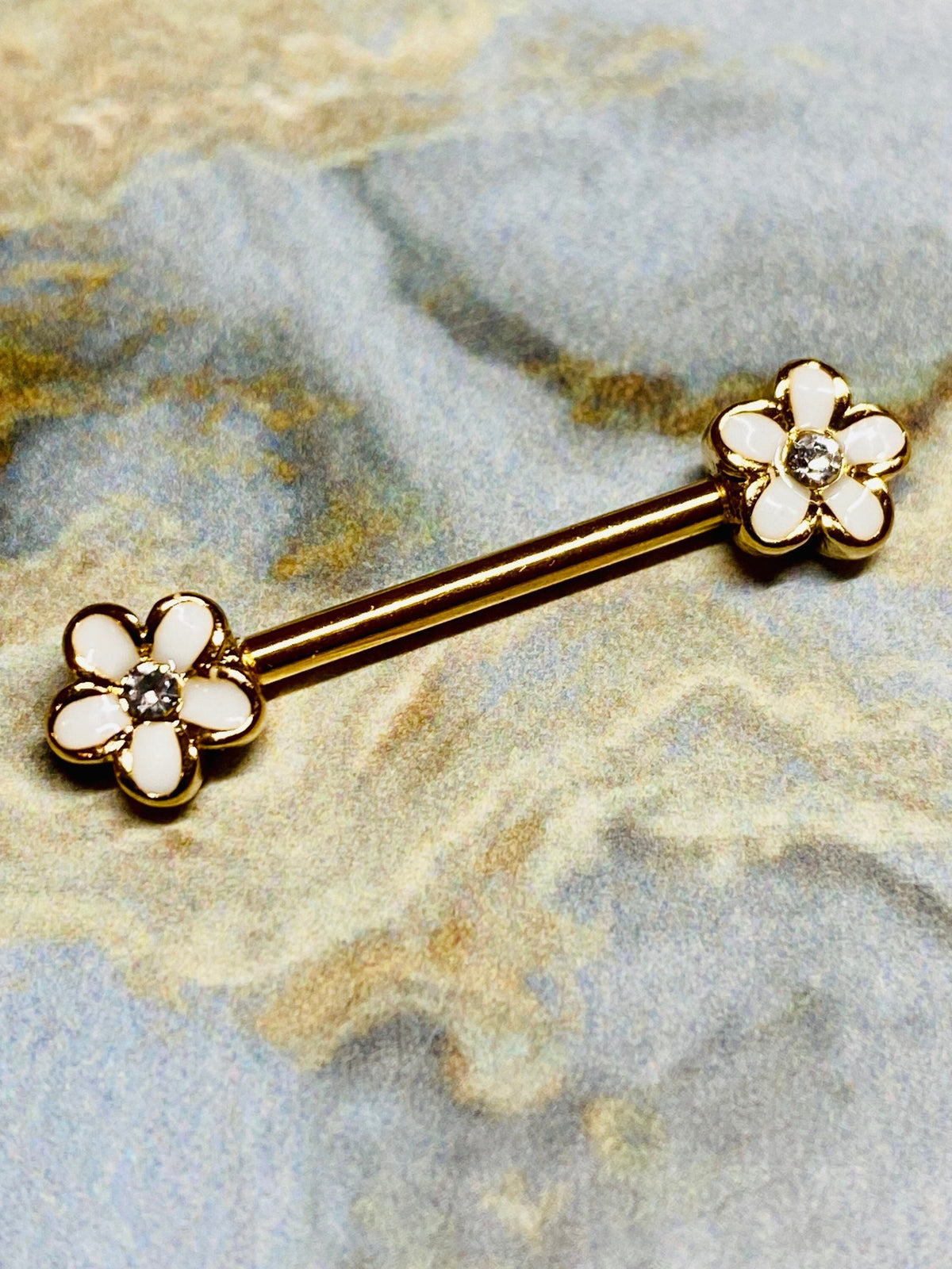 A set of Sparkling Plumeria Flowers Nipple Barbell