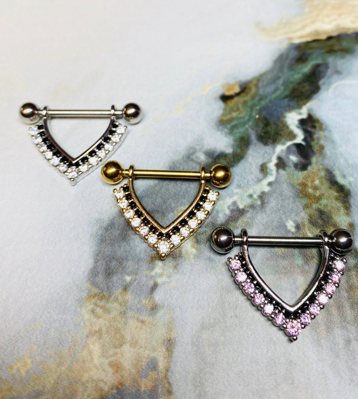 A set of Clear Stones Paved Chevron Shaped Nipple Barbells. Nipple Piercings. Nipple Jewlery. Nipple Rings.