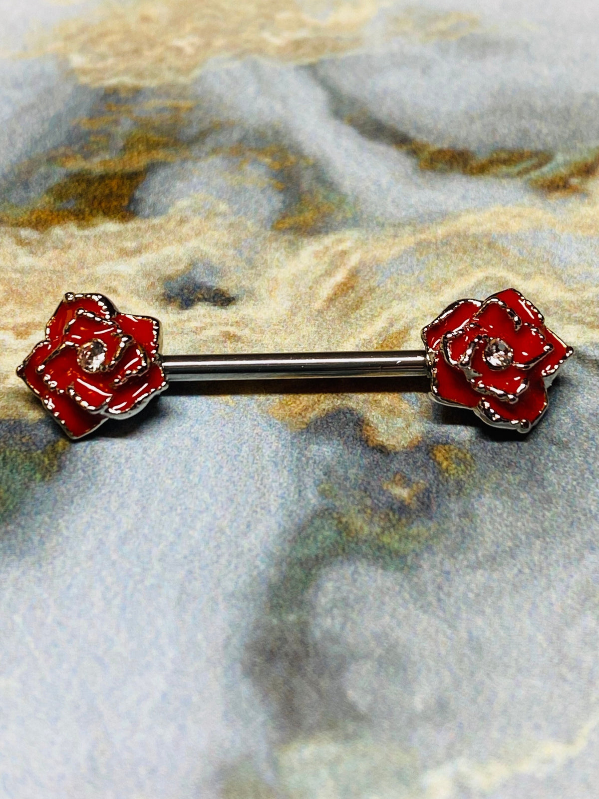 A set of Classic Red Rose Nipple Barbell