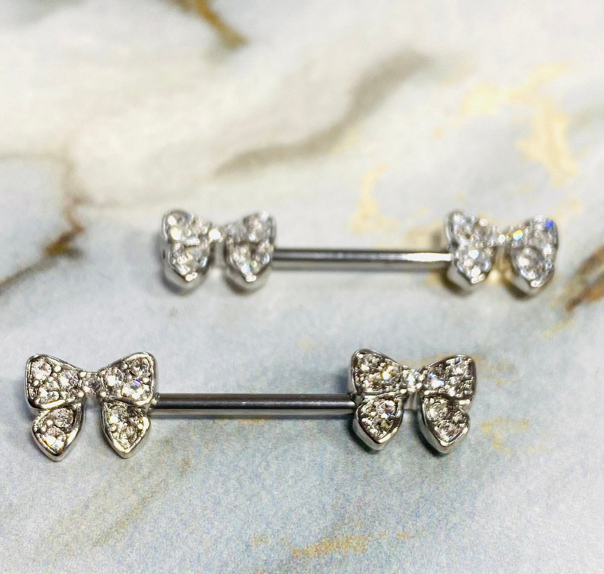 14G Silver Dainty and Sparkling Bow-Tie Nipple Barbell. Nipple Piercings. Nipple Rings. Nipple Jewelry.