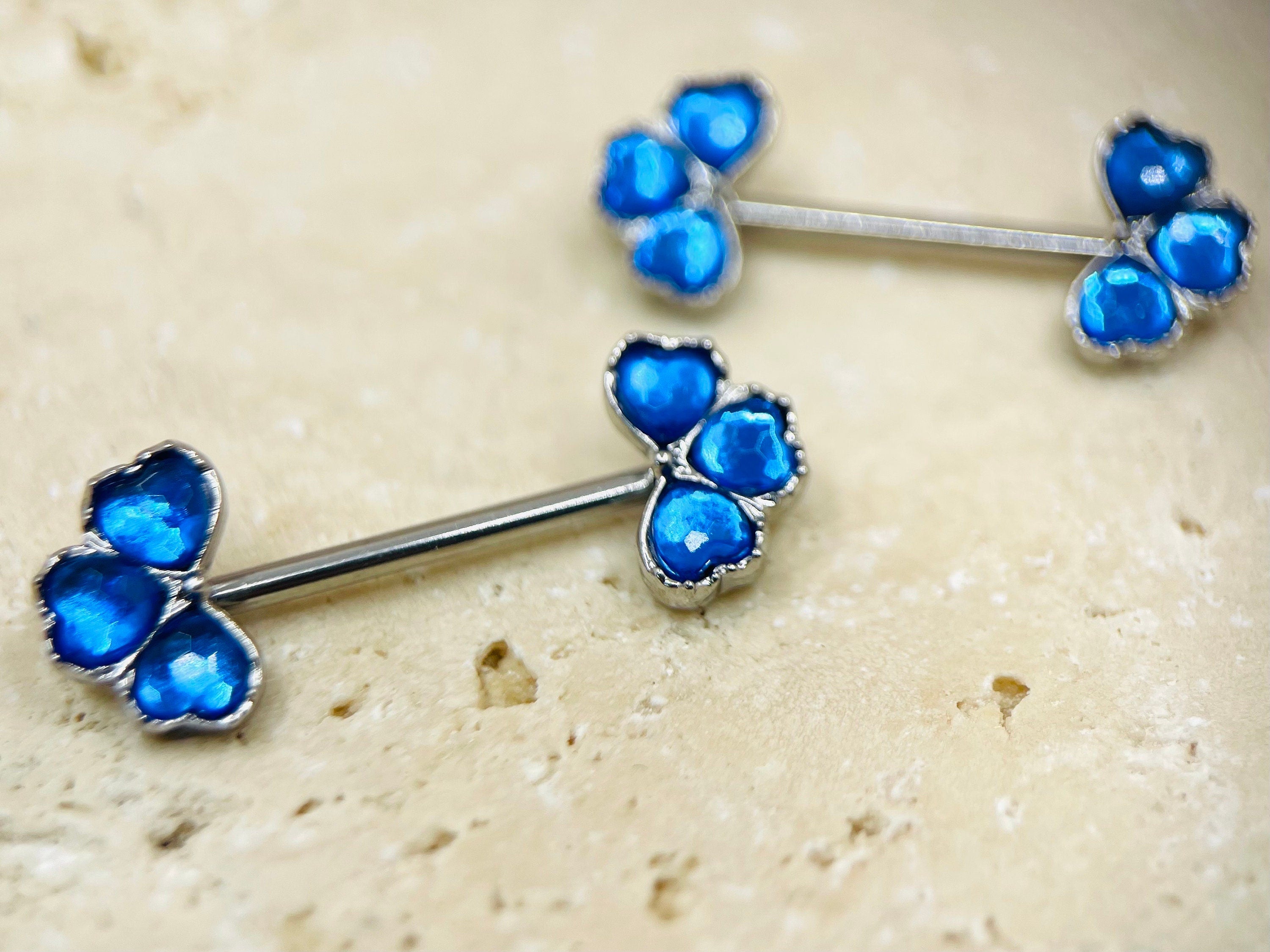 Pair of 14G Blue Gem Black Clover Ends Nipple Barbell